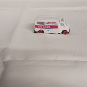White and Red Toy Ambulance